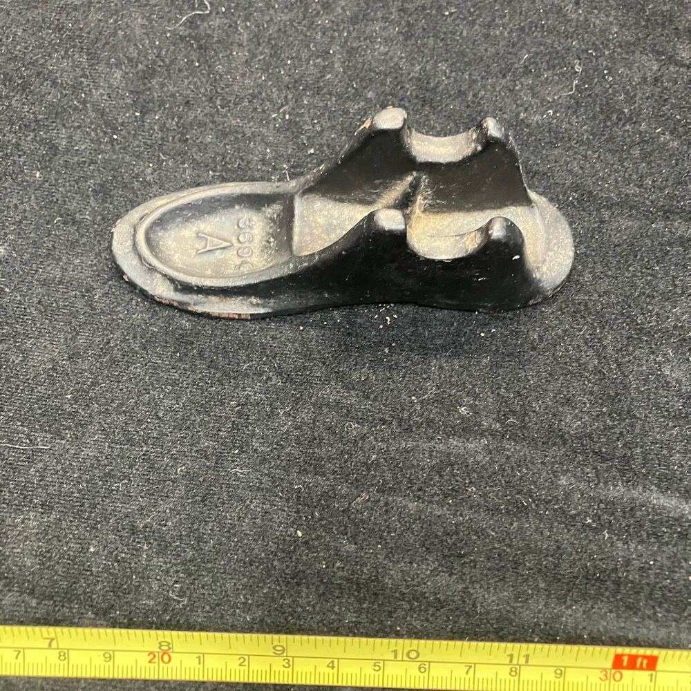 Black metal Shoe Heel Repair antique